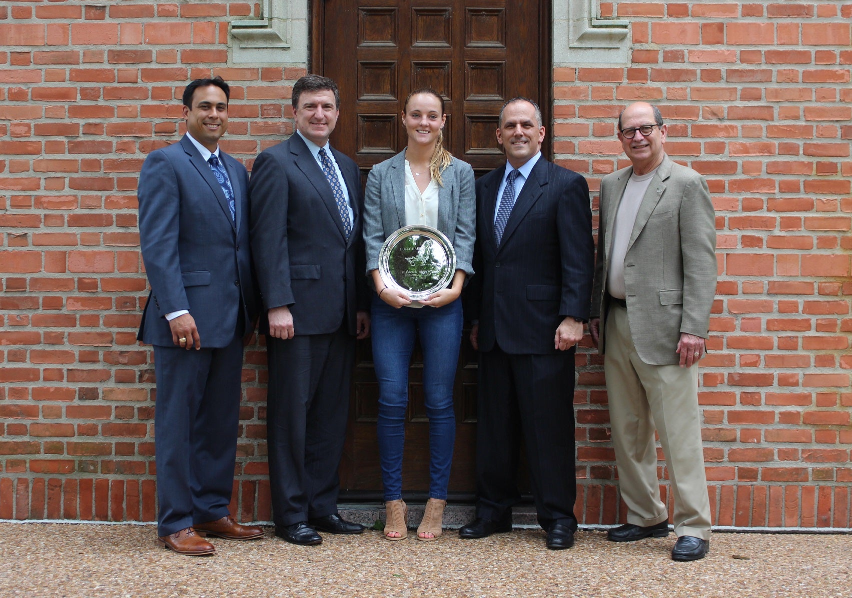 Holly Hargreaves '16 with law award and SMGT faculty