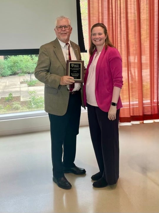 Professor Rackley and Dean Kimbro with teaching award
