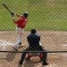 view of athletes playing baseball in the field